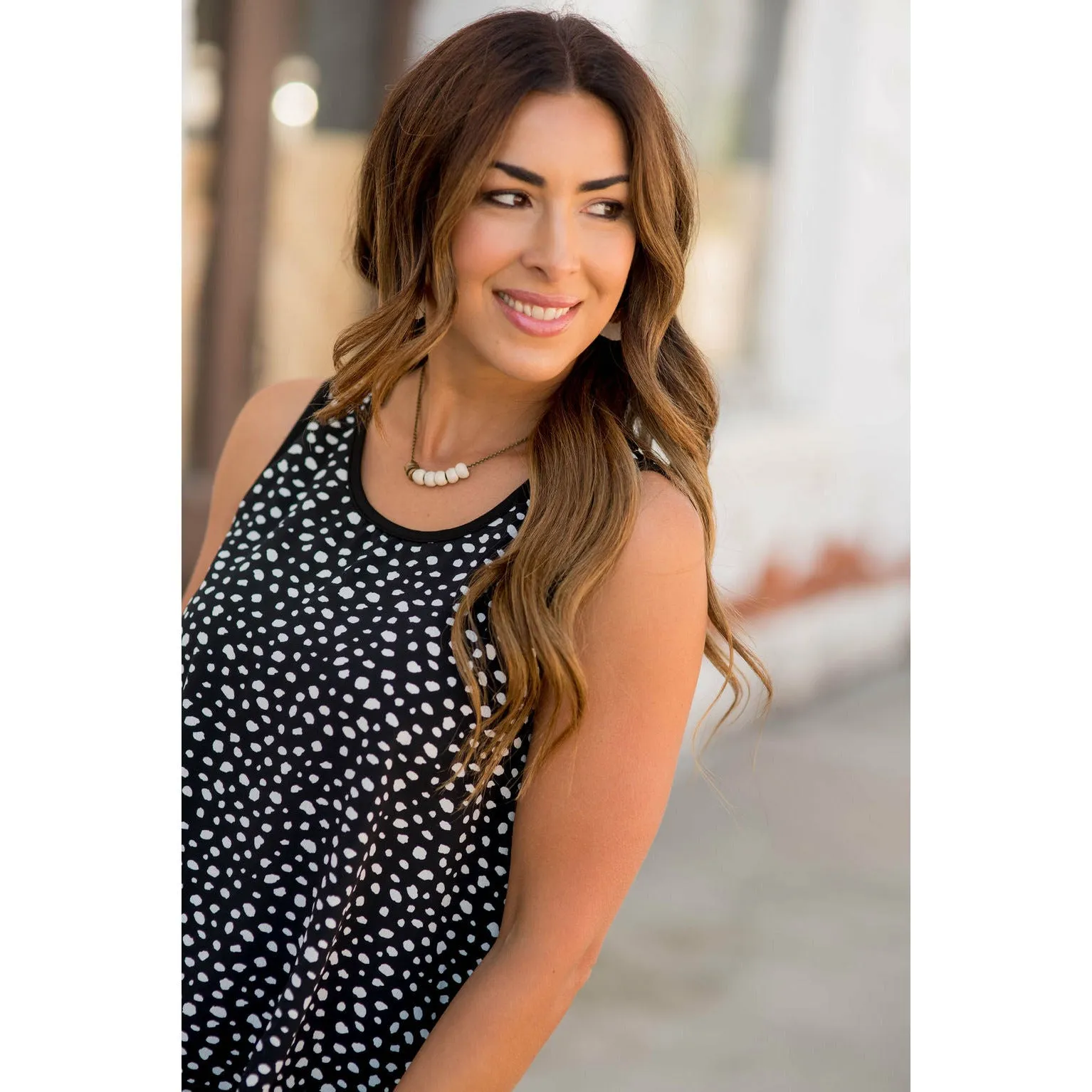 Circular Solid Back Tank Blouse