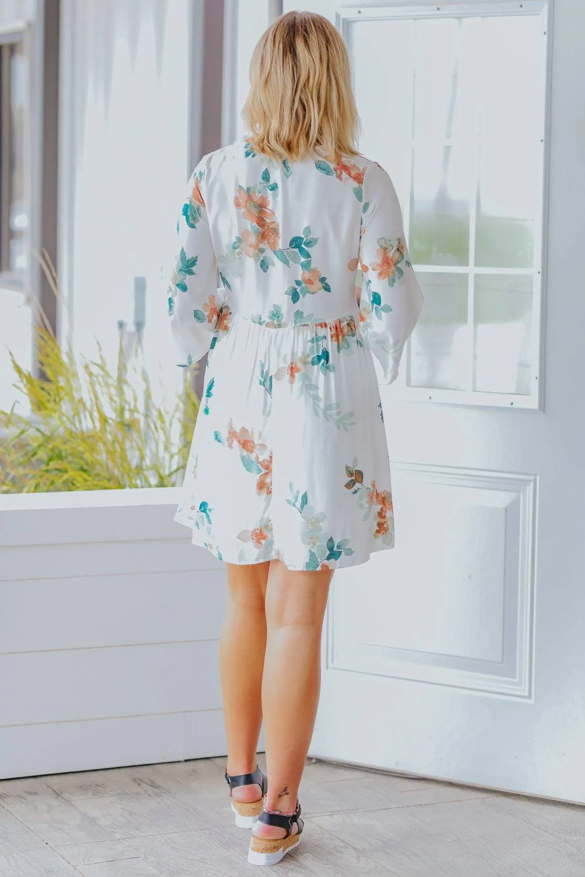 Experience Trust Floral Empire Waist Short Bell Sleeve Dress in Ivory